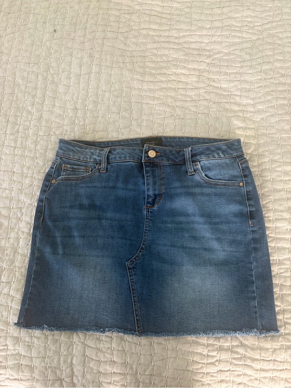 Celebrity Pink Distressed Denim Mini Skirt